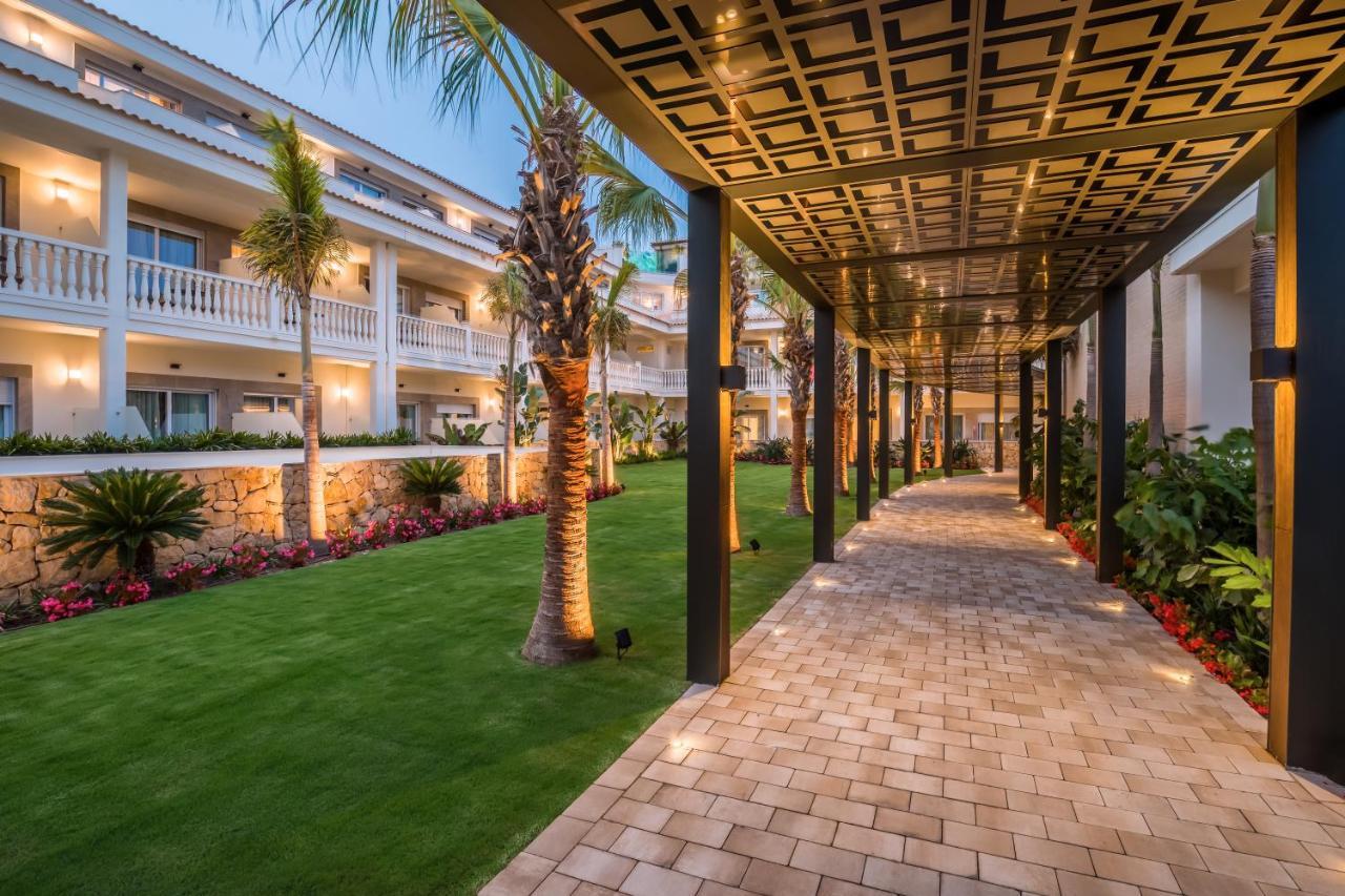 Hotel Barcelo La Nucia Palms Esterno foto The resort's main walkway